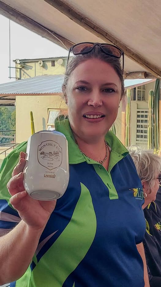 A member showing a monthly club award